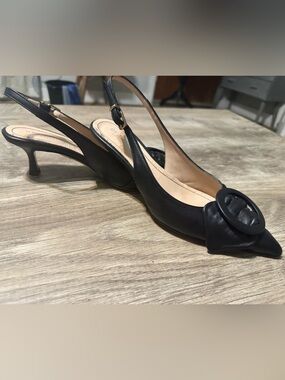 Beautiisoles. Black Leather Slingback Kitten Heel with Decorative Round Accent